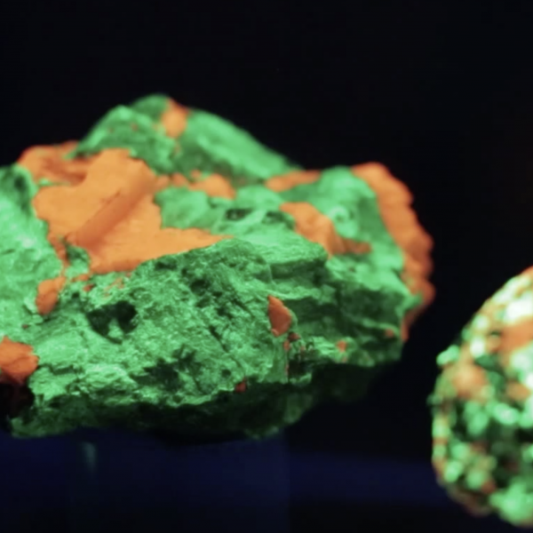 glowing green and orange rocks