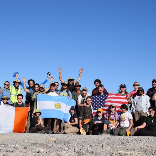 Students with flags at huaco