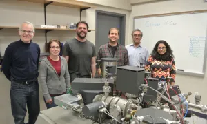 professor and students in lab