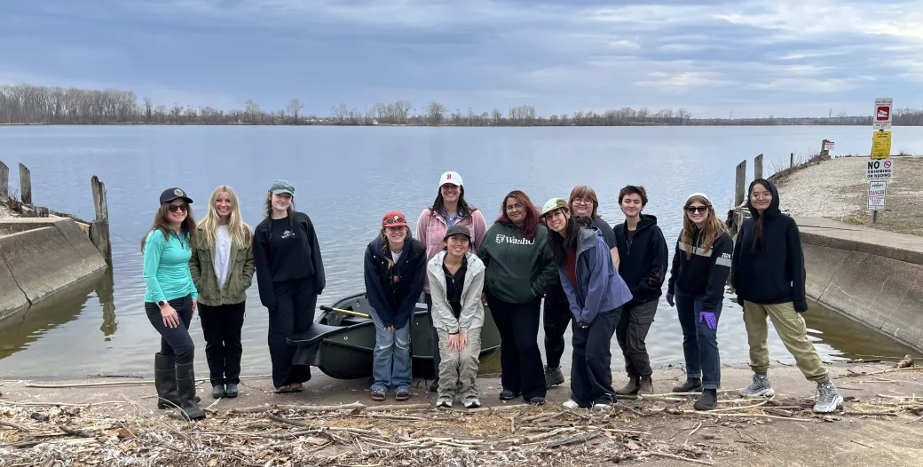 "Picture of students and instructor posing in front of Creve Coeur Lake"