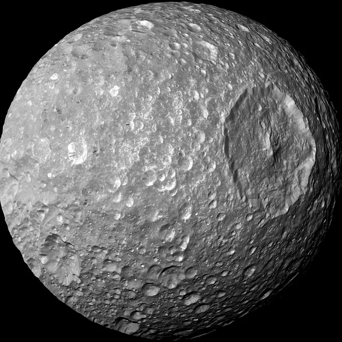 "Saturn's moon Mimas photographed by NASA, JPL-Caltech"
