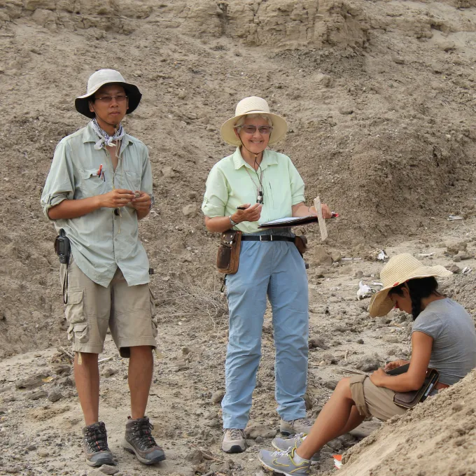 Anna "Kay" Behrensmeyer, standing right, at a field site in Turkana Basin in Northern Kenya with students Andrew Du (standing) and Amelia Villasenor. Photo by David Patterson