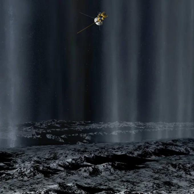 Artist’s conception of the Cassini spacecraft flying amid geysers on Enceladus, a moon of Saturn. Credit: Karl Kofoed / NASA