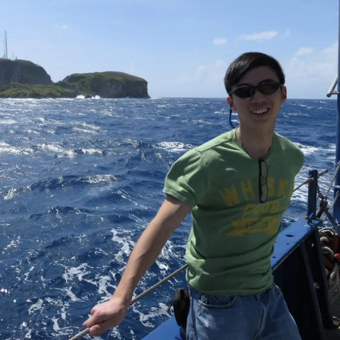 Wei retrieving ocean bottom seismometers at the Marianas Trench.